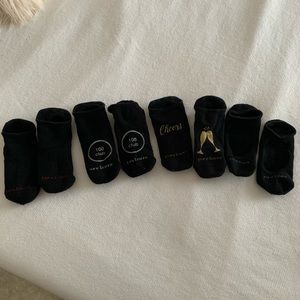 Four pairs of Pure Barre socks